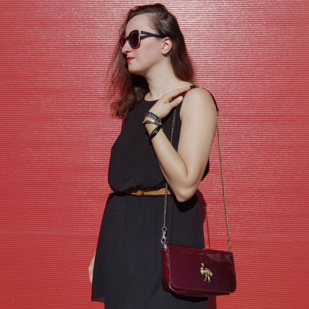 Sous Les Pavés Baguette Maï Taï bag in prune varnished leather