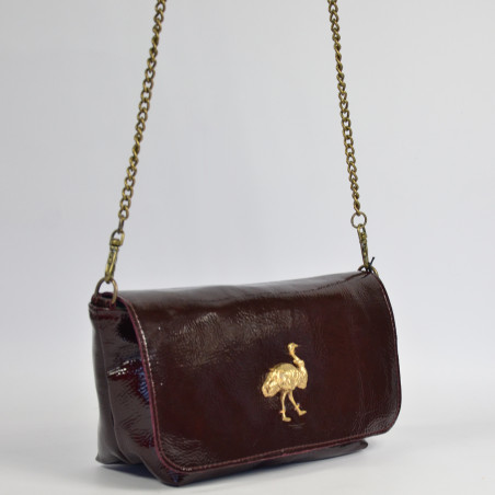 Sous Les Pavés Baguette Maï Taï bag in prune varnished leather