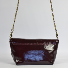 Sous Les Pavés Baguette Maï Taï bag in prune varnished leather