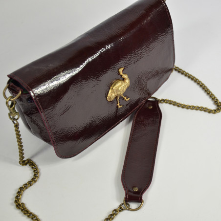 Sous Les Pavés Baguette Maï Taï bag in prune varnished leather
